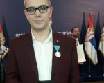 Председник Србије одликовао нишког студента Јована Милића, сребрном медаљом за заслуге